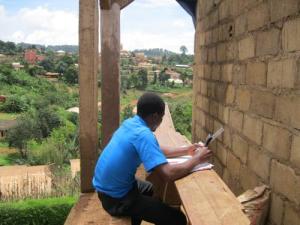 Boy working outside the building soon he will be working inside