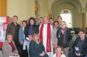 Reverend Stephen Bentley and some the congregation at Journey MCC