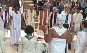 Monica and Catherine during the ceremony